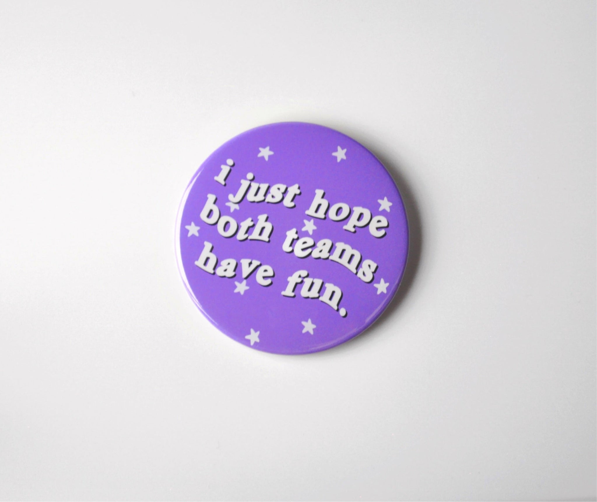 Purple button that says "i just hope both teams have fun" TCU gameday pin