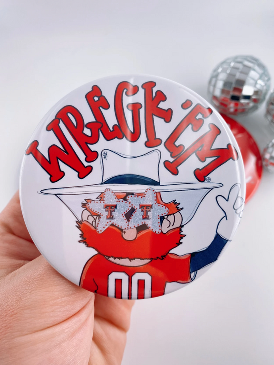 Button badge with 'Wreck 'Em' text and Raider red on a white background