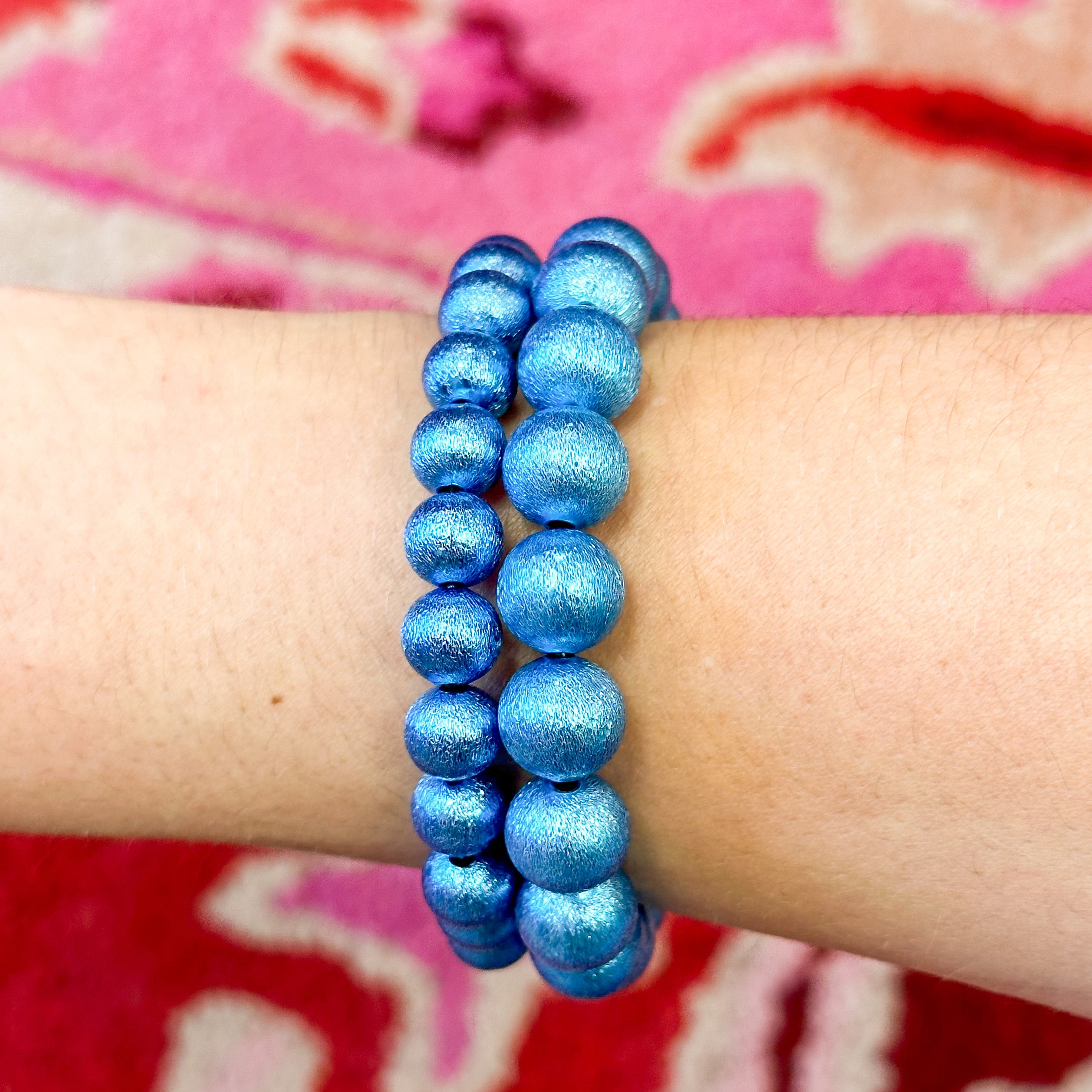 Pink and blue best sale bracelets