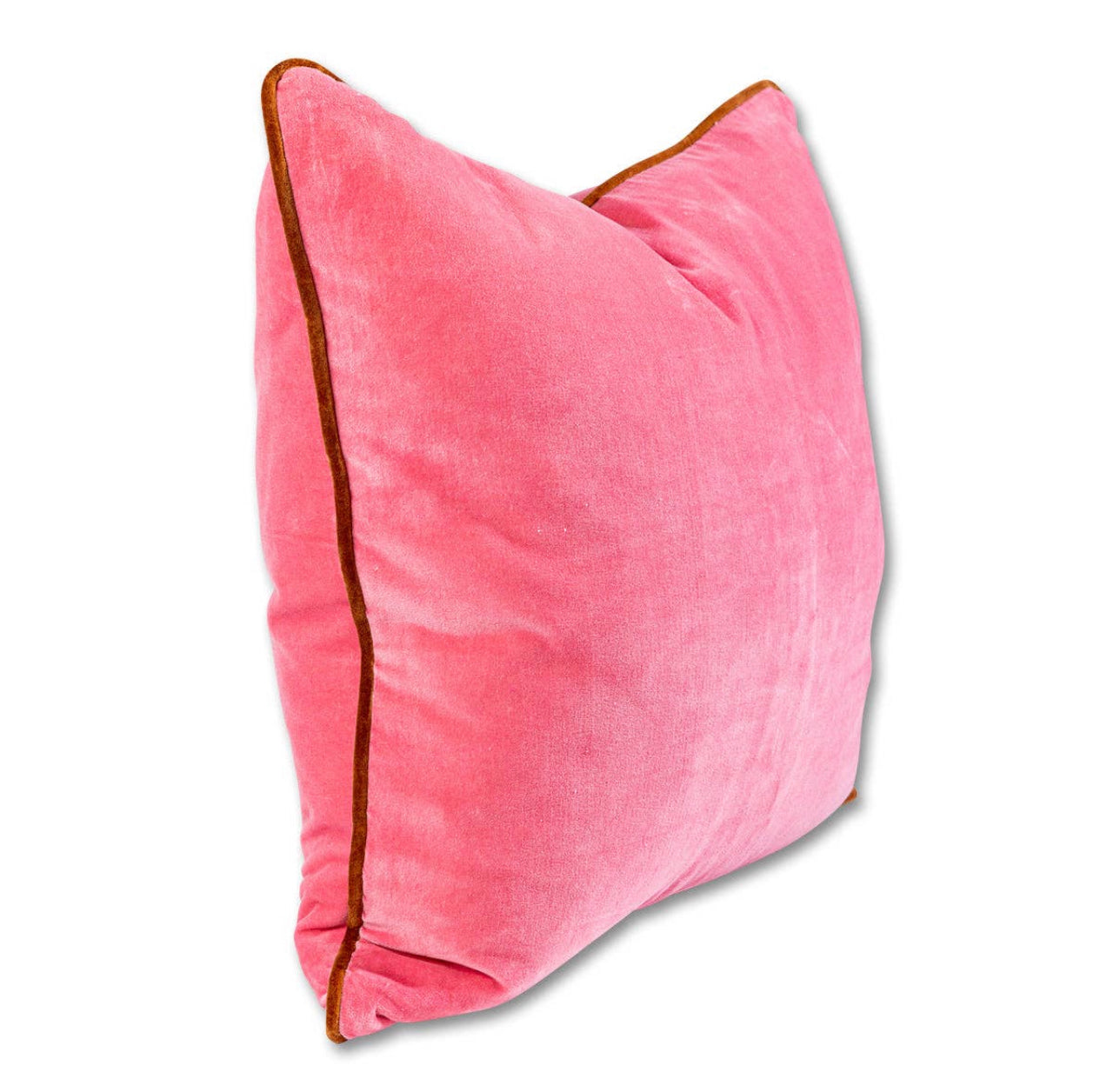 A velvet square rose pink pillow with brown trim edges